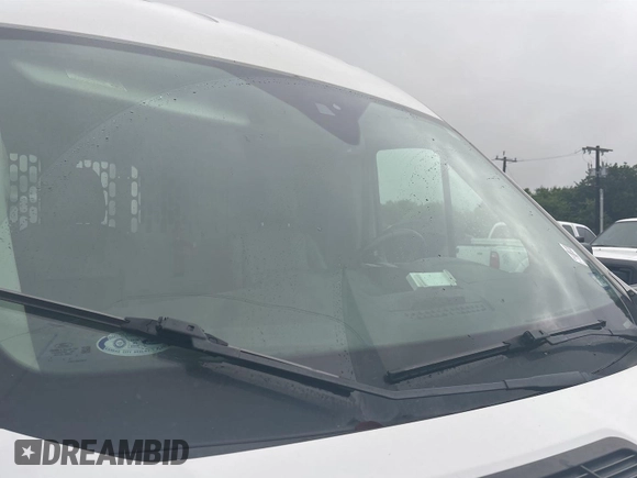 2018 Ford Transit z VIN 1FTYE1CM4JKB42317, wystawiony jako IAAI lot #42558333 z przebiegiem 204 042 mil mil oraz . Historia ofert i sprzedaży dostępna na DreamBid. Obrazek 21.