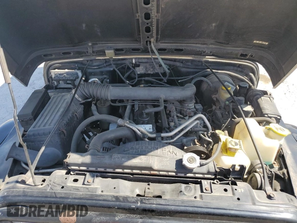 2001 Jeep Wrangler Sahara with VIN 1J4FA59S71P343366, listed as a Copart auction lot 57826405 with 156,436 mi miles and Salvage title. Bid and sale history available at DreamBid. Image 11.