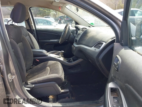 2013 Dodge Journey SE Plus with VIN 3C4PDCAB9DT582144, listed as a IAAI auction lot 41964828 with 171,398 mi miles and . Bid and sale history available at DreamBid. Image 5.