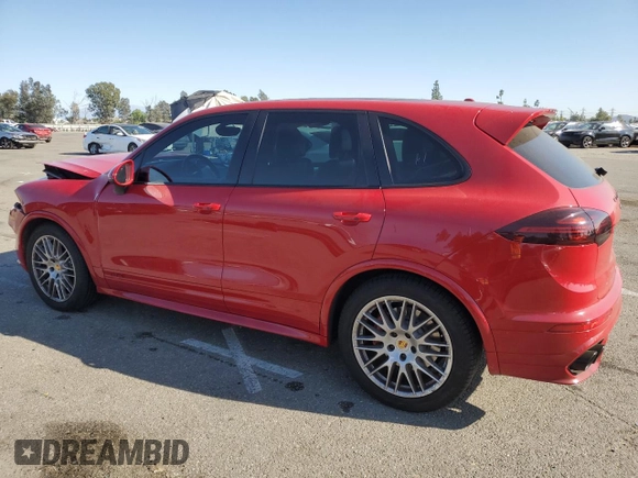 2017 Porsche Cayenne GTS with VIN WP1AD2A2XHLA82557, listed as a Copart auction lot 80534824 with 117,538 mi miles and Salvage title. Bid and sale history available at DreamBid. Image 2.