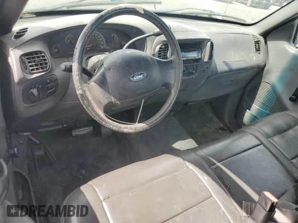 2004 Ford F-150 XL with VIN 2FTRF17294CA59985, listed as a Copart auction lot 55296195 with 220,933 mi miles and Salvage title. Bid and sale history available at DreamBid. Image 8.
