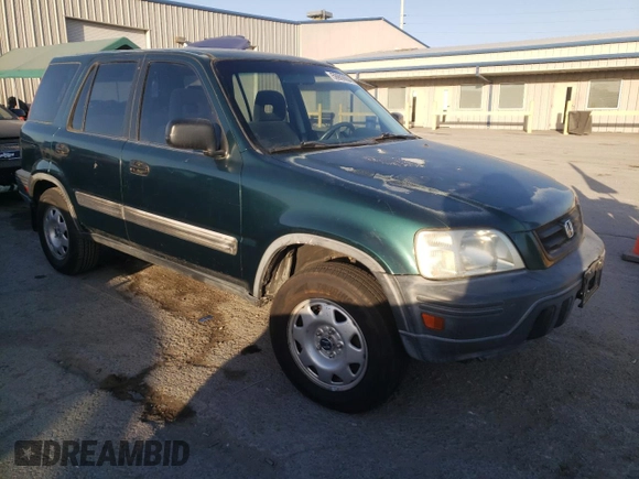 1999 Honda CR-V LX with VIN JHLRD1849XC083285, listed as a Copart auction lot 59909904 with 127,759 mi miles and Salvage Title. Bid and sale history available at carsss.com. Image 4.
