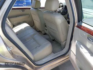 2006 Cadillac DTS w/1SC with VIN 1G6KD57Y26U112518, listed as a IAAI auction lot 42100747 with 122,149 mi miles. Bid and sale history available at carsss.com. Image 8.