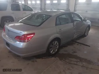 2005 Toyota Avalon XL with VIN 4T1BK36BX5U045813, listed as a IAAI auction lot 42061631 with 150,436 mi miles. Bid and sale history available at carsss.com. Image 4.
