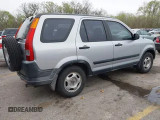 2002 Honda CR-V LX with VIN JHLRD68422C015173, listed as a IAAI auction lot 41959037 with 217,058 mi miles and . Bid and sale history available at carsss.com. Image 4.