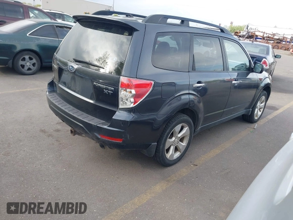 2009 Subaru Forester with VIN JF2SH65629H705318, listed as a IAAI auction lot 42120698 with 194,582 mi miles and . Bid and sale history available at DreamBid. Image 4.