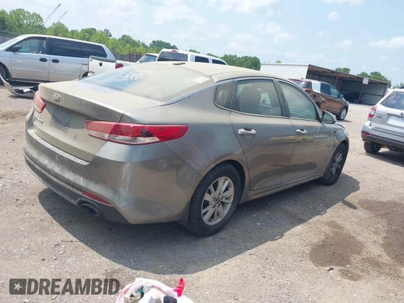 2016 Kia Optima LX z VIN 5XXGT4L34GG097375, wystawiony jako IAAI lot #42401993 z przebiegiem 145 389 mil mil oraz . Historia ofert i sprzedaży dostępna na DreamBid. Obrazek 4.