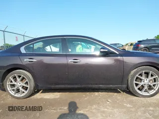 2011 Nissan Maxima SV with VIN 1N4AA5AP5BC853124, listed as a IAAI auction lot 42391492 with 152,097 mi miles and . Bid and sale history available at DreamBid. Image 13.
