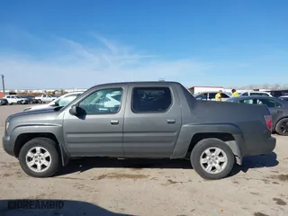 2007 Honda Ridgeline RTL w/Leather with VIN 2HJYK16547H526249, listed as a IAAI auction lot 41769625 with 173,168 mi miles. Bid and sale history available at carsss.com. Image 14.