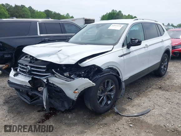 2022 Volkswagen Tiguan SE with VIN 3VV3B7AX3NM176770, listed as a IAAI auction lot 42114378 with 37,448 mi miles and . Bid and sale history available at DreamBid. Image 2.