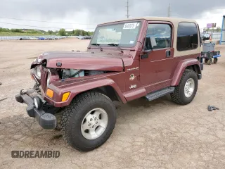 2002 Jeep Wrangler Sahara with VIN 1J4FA59S32P746410, listed as a Copart auction lot 56403075 with 147,968 mi miles and Salvage title. Bid and sale history available at DreamBid. Image 1.