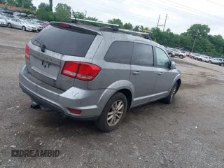 2017 Dodge Journey SXT with VIN 3C4PDDBG8HT577782, listed as a IAAI auction lot 42409731 with 136,618 mi miles and . Bid and sale history available at DreamBid. Image 4.