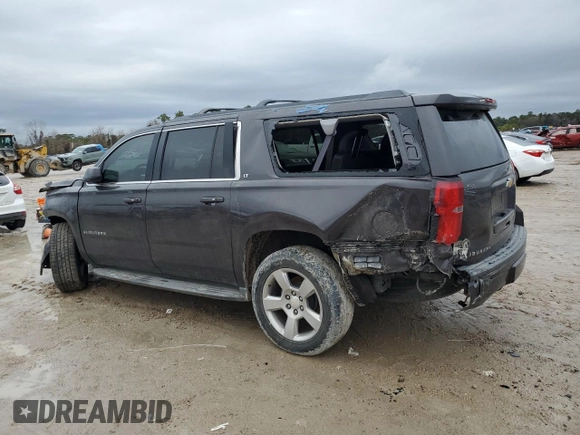 2015 Chevrolet Suburban LT with VIN 1GNSCJKC1FR159411, listed as a Copart auction lot 52169465 with 145,511 mi miles and Salvage title. Bid and sale history available at DreamBid. Image 2.