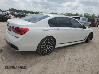 2019 BMW 7 Series 750i с VIN WBA7F0C52KGM24906, выставлен на аукционе Copart как лот 53934735 с пробегом 96 247 миль миль и Списание • Salvage title. История ставок и продаж доступна на DreamBid. Изображение 3.