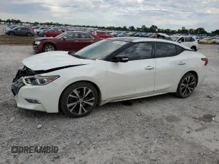 2018 Nissan Maxima Platinum with VIN 1N4AA6AP6JC404541, listed as a Copart auction lot 58216865 with 85,673 mi miles and Salvage title. Bid and sale history available at DreamBid. Image 1.
