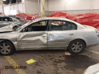 2002 Nissan Altima S with VIN 1N4AL11D22C216832, listed as a IAAI auction lot 41526142 with 1 mi miles. Bid and sale history available at carsss.com. Image 14.