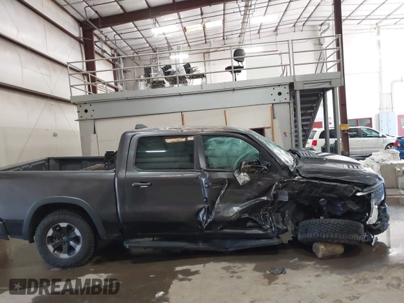 2019 Ram 1500 Rebel with VIN 1C6SRFLT2KN537313, listed as a IAAI auction lot 42545382 with Not provided miles and . Bid and sale history available at DreamBid. Image 12.