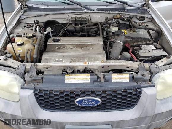 2005 Ford Escape Hybrid with VIN 1FMCU96H55KC74059, listed as a Copart auction lot 57065685 with 154,807 mi miles and Salvage title. Bid and sale history available at DreamBid. Image 12.
