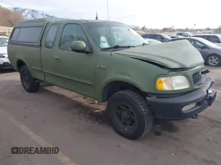 1997 Ford F-150 XL with VIN 1FTDX1861VKA60604, listed as a IAAI auction lot 41060909 with 269,715 mi miles. Bid and sale history available at carsss.com. Image 1.