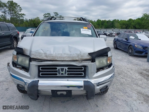 2008 Honda Ridgeline RTL with VIN 2HJYK16568H527114, listed as a IAAI auction lot 42042902 with 127,159 mi miles. Bid and sale history available at carsss.com. Image 12.