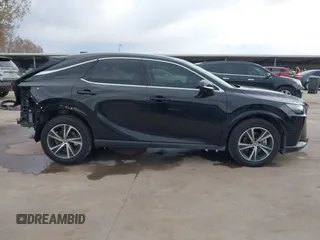 2024 Lexus RX 350 z VIN 2T2BAMBA4RC026361, wystawiony jako IAAI lot #41364276 z przebiegiem 15 528 mil mil oraz . Historia ofert i sprzedaży dostępna na DreamBid. Obrazek 14.
