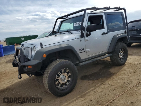 2009 Jeep Wrangler X with VIN 1J4FA24199L787574, listed as a Copart auction lot 58189835 with 74,331 mi miles and Salvage title. Bid and sale history available at DreamBid. Image 1.