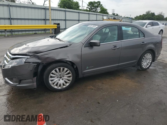 2012 Ford Fusion Hybrid z VIN 3FADP0L33CR211609, wystawiony jako Copart lot #60873005 z przebiegiem 144 474 mil mil oraz Szkoda całkowita • Salvage title. Historia ofert i sprzedaży dostępna na DreamBid. Obrazek 1.