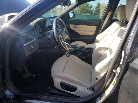 2015 BMW 3 Series 328i xDrive with VIN WBA3B3C59FJ985091, listed as a Copart auction lot 57658705 with 106,521 mi miles and Salvage title. Bid and sale history available at DreamBid. Image 7.