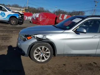 2013 BMW X1 xDrive28i with VIN WBAVL1C57DVR84747, listed as a IAAI auction lot 41273794 with 93,738 mi miles. Bid and sale history available at carsss.com. Image 17.