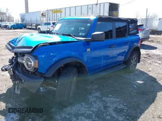2023 Ford Bronco z VIN 1FMEE5BP1PLA88463, wystawiony jako IAAI lot #41871905 z przebiegiem 36 223 mil mil oraz . Historia ofert i sprzedaży dostępna na DreamBid. Obrazek 2.