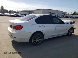 2012 BMW 3 Series 328i with VIN WBA3C1C5XCA696847, listed as a Copart auction lot 53005425 with 143,725 mi miles and Salvage title. Bid and sale history available at DreamBid. Image 3.