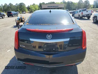 2014 Cadillac XTS Premium z VIN 2G61P5S3XE9238362, wystawiony jako Copart lot #52135695 z przebiegiem 122 428 mil mil oraz Szkoda całkowita • Salvage title. Historia ofert i sprzedaży dostępna na DreamBid. Obrazek 6.