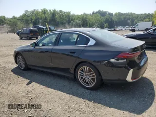 2024 BMW 5 Series 530i xDrive with VIN WBA53FJ01RCP99388, listed as a Copart auction lot 66712874 with 0 mi miles and Salvage Title. Bid and sale history available at carsss.com. Image 2.