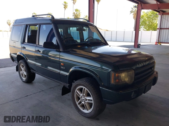 2003 Land Rover Discovery SE z VIN SALTW16413A785633, wystawiony jako IAAI lot #42196601 z przebiegiem 128 864 mil mil oraz . Historia ofert i sprzedaży dostępna na DreamBid. Obrazek 1.