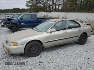 1996 Honda Accord with VIN 1HGCE6647TA010021, listed as a Copart auction lot 86294974 with 162,400 mi miles and Salvage title. Bid and sale history available at DreamBid. Image 1.