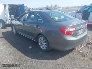 2014 Toyota Camry Hybrid LE with VIN 4T1BD1FK6EU129691, listed as a IAAI auction lot 41796112 with 264,392 mi miles. Bid and sale history available at carsss.com. Image 3.