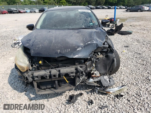 2013 Ford Focus SE z VIN 1FADP3F20DL330366, wystawiony jako Copart lot #59204595 z przebiegiem 163 305 mil mil oraz Szkoda całkowita • Salvage title. Historia ofert i sprzedaży dostępna na DreamBid. Obrazek 5.