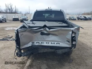 2023 Toyota Tacoma 4WD SR with VIN 3TMCZ5AN0PM609672, listed as a IAAI auction lot 41830191 with 24,244 mi miles. Bid and sale history available at carsss.com. Image 16.