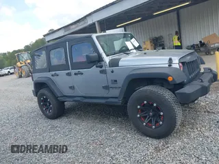 2014 Jeep Wrangler Unlimited Sport with VIN 1C4BJWDG3EL135351, listed as a IAAI auction lot 41947408 with 104,460 mi miles. Bid and sale history available at carsss.com. Image 13.