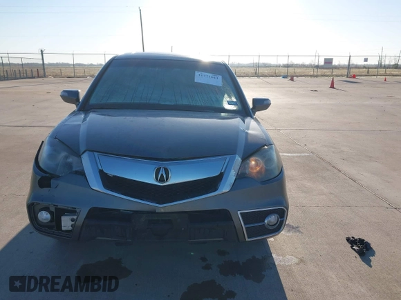 2012 Acura RDX Tech Pkg with VIN 5J8TB2H57CA000824, listed as a IAAI auction lot 41771611 with 265,417 mi miles. Bid and sale history available at carsss.com. Image 6.