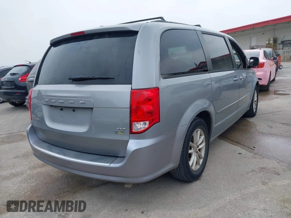 2014 Dodge Grand Caravan SXT z VIN 2C4RDGCG7ER212419, wystawiony jako IAAI lot #42272015 z przebiegiem 175 801 mil mil oraz . Historia ofert i sprzedaży dostępna na DreamBid. Obrazek 4.