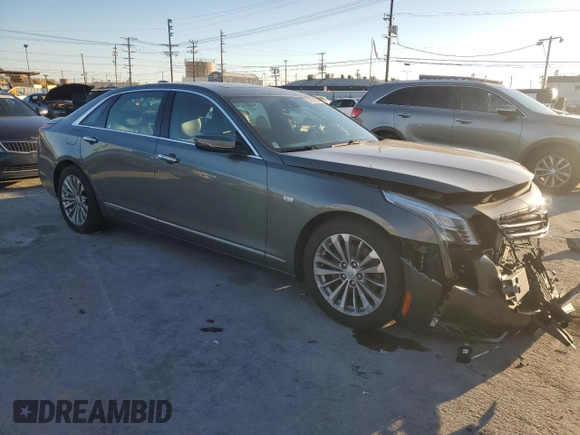 2017 Cadillac CT6 Plug-In RWD with VIN LREKK5RX0HA066782, listed as a Copart auction lot 42057354 with 66,103 mi miles and . Bid and sale history available at DreamBid. Image 4.