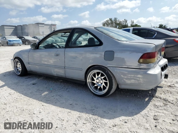 1997 Honda Civic EX z VIN 1HGEJ8143VL043998, wystawiony jako Copart lot #51795345 z przebiegiem 129 631 mil mil oraz Nie do naprawy • Non repairable. Historia ofert i sprzedaży dostępna na DreamBid. Obrazek 2.