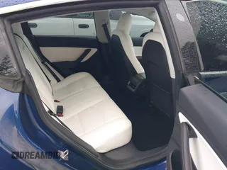 2019 Tesla Model 3 Long Range with VIN 5YJ3E1EB8KF512950, listed as a IAAI auction lot 41836349 with 55,607 mi miles and . Bid and sale history available at DreamBid. Image 8.