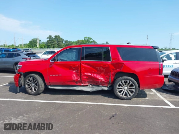 2015 Chevrolet Suburban LT with VIN 1GNSCJKC8FR291713, listed as a IAAI auction lot 42323281 with 226,708 mi miles and . Bid and sale history available at DreamBid. Image 14.