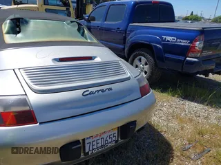 1999 Porsche 911 with VIN WP0CA2999XS652816, listed as a IAAI auction lot 41975822 with 291,258 mi miles and . Bid and sale history available at DreamBid. Image 16.