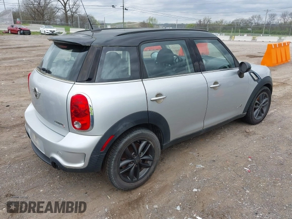 2011 MINI Countryman S with VIN WMWZC5C51BWM10385, listed as a IAAI auction lot 41952679 with 112,008 mi miles and . Bid and sale history available at DreamBid. Image 4.