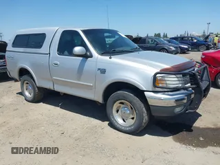 2000 Ford F-150 XL z VIN 1FTRF18L1YKA63179, wystawiony jako IAAI lot #42532771 z przebiegiem 116 604 mil mil oraz . Historia ofert i sprzedaży dostępna na DreamBid. Obrazek 1.