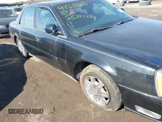 2004 Cadillac DeVille DHS z VIN 1G6KE57YX4U261849, wystawiony jako IAAI lot #41518835 z przebiegiem Nie podano mil oraz . Historia ofert i sprzedaży dostępna na DreamBid. Obrazek 6.