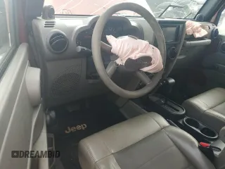 2009 Jeep Wrangler X с VIN 1J4FA24179L760213, выставлен на аукционе Copart как лот 59148545 с пробегом 129 303 миль миль и Списание • Salvage title. История ставок и продаж доступна на DreamBid. Изображение 8.